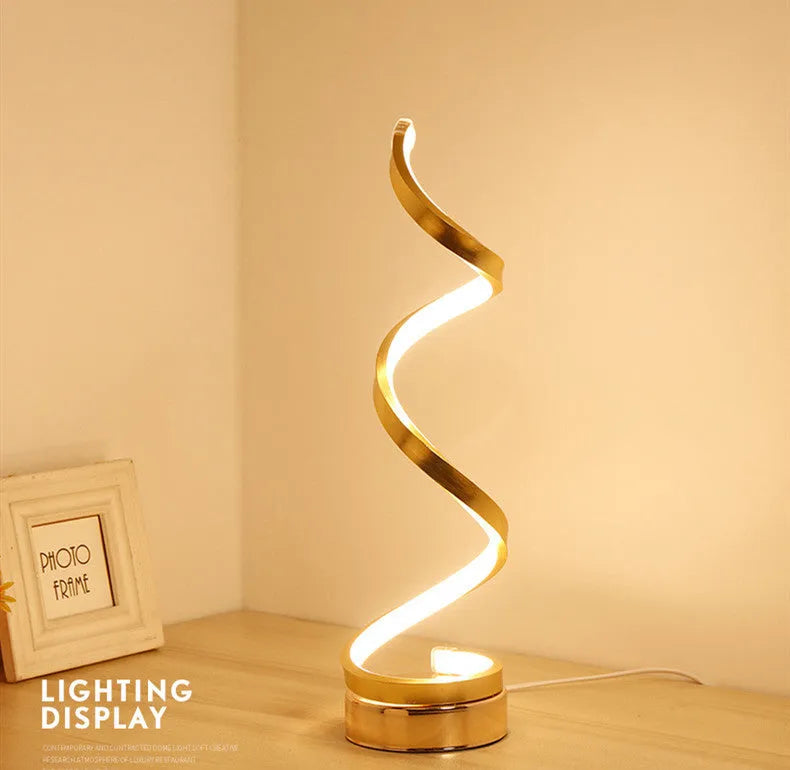 Gold 24W LED table lamp with curved metal base and acrylic shade, remote control, 125mm x 450mm
