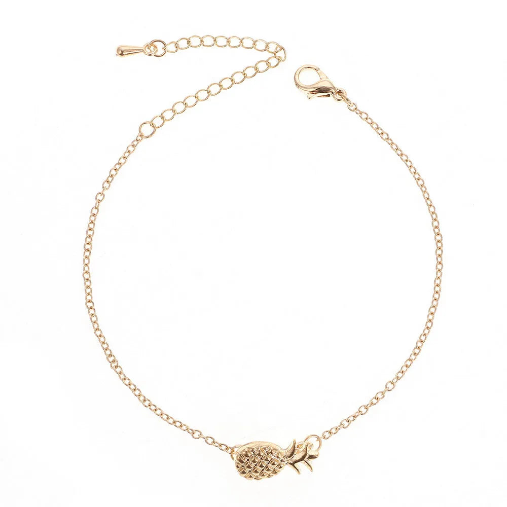 Gold and silver alloy women's bracelet with a simple pineapple charm design.