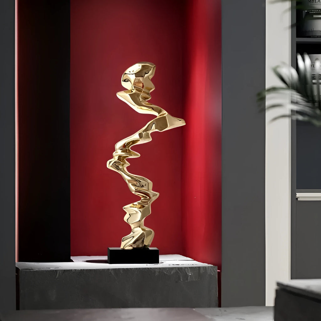 Abstract resin ornament in modern style with metallic finish for hallway or living room decoration