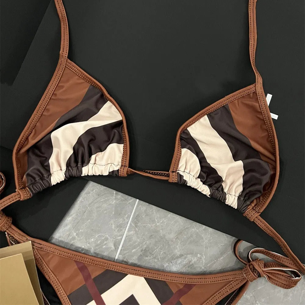 Women's black and white floral bikini set with briefs style bottoms in polyester for summer swimming