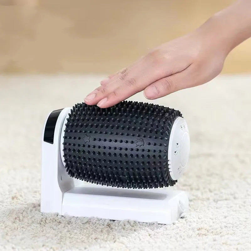 White automatic cat self groomer mounted in corner with silicone bristles for brushing