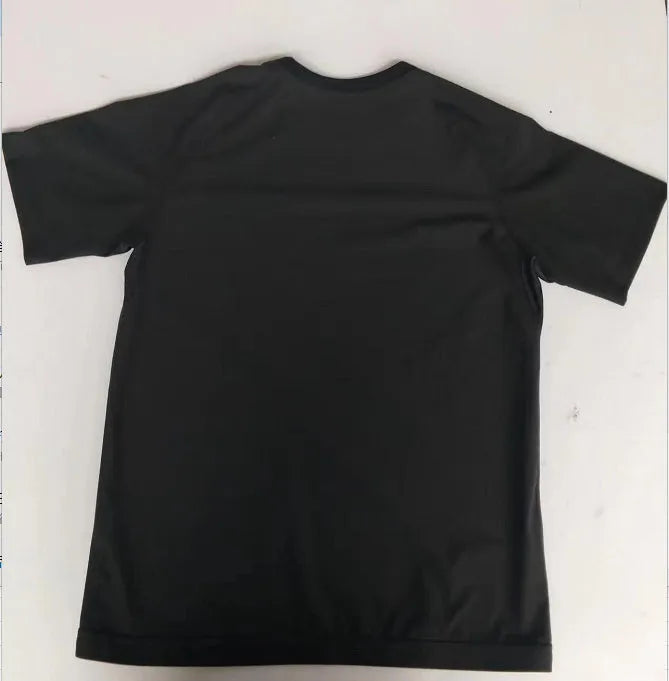 Men's short sleeve black polyester body shaping fitness tank top on a plain background