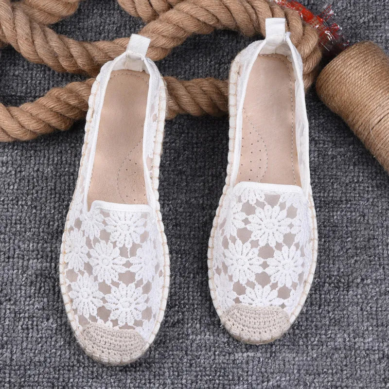 Women's flat linen fisherman shoes in white with a round toe and rubber sole.