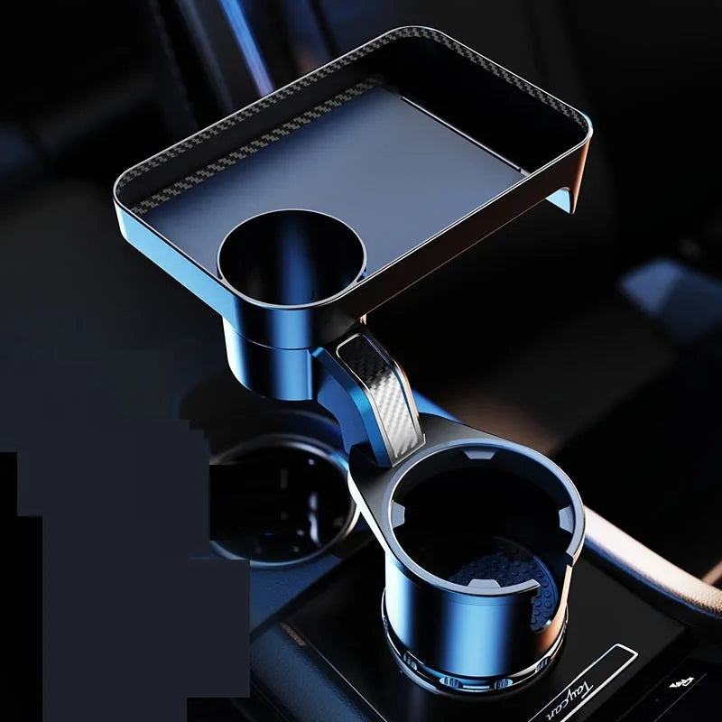 Black car cup holder with an integrated rotating dinner tray, shown in a vehicle.