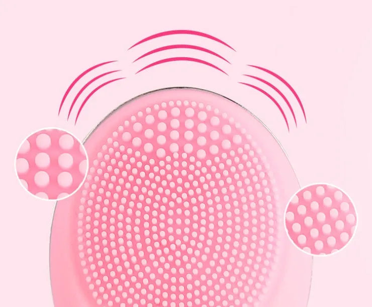 Ultrasonic electric face wash brush in pink with silicone brush head, compact design for deep pore cleansing