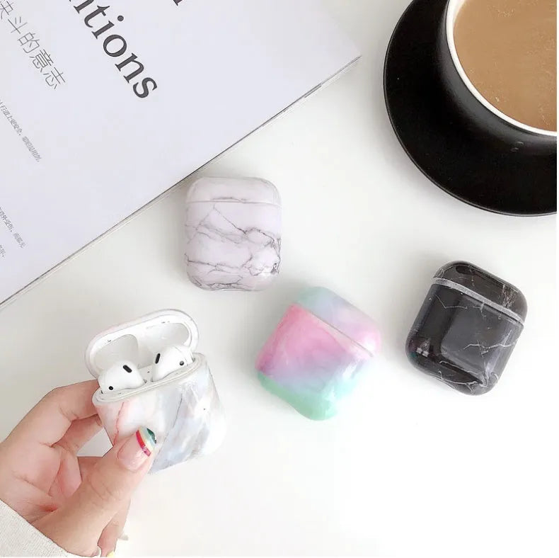 White marble hard PC protective case cover for Apple AirPods 1 and AirPods 2 wireless earphones.