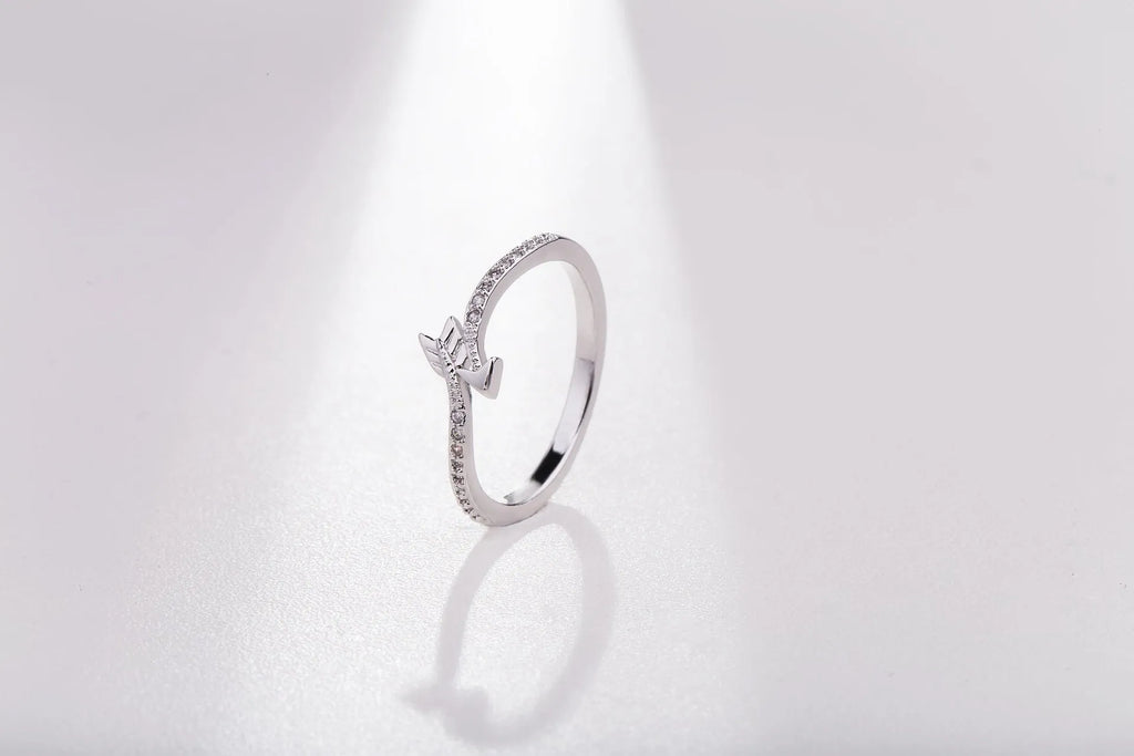 Women's arrow feather ring with white copper plating and cubic zirconia, available in US sizes 5-8