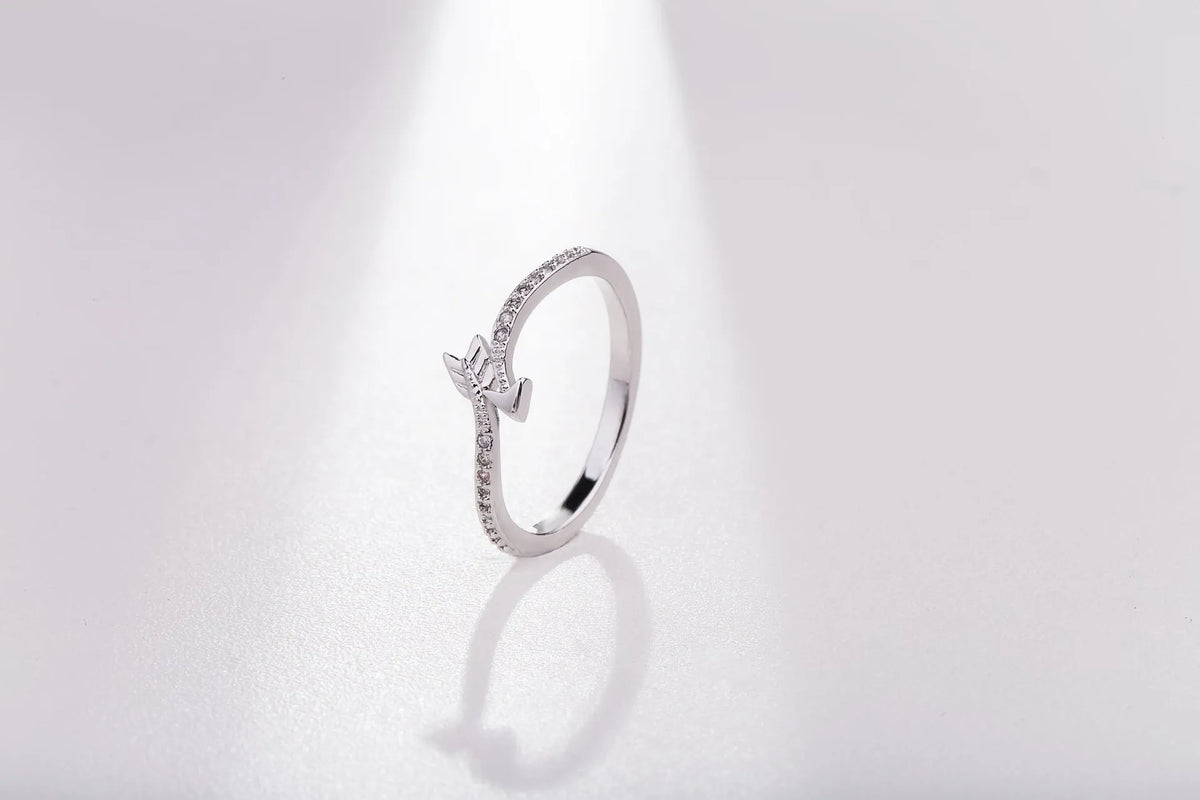 Women's arrow feather ring with white copper plating and cubic zirconia, available in US sizes 5-8