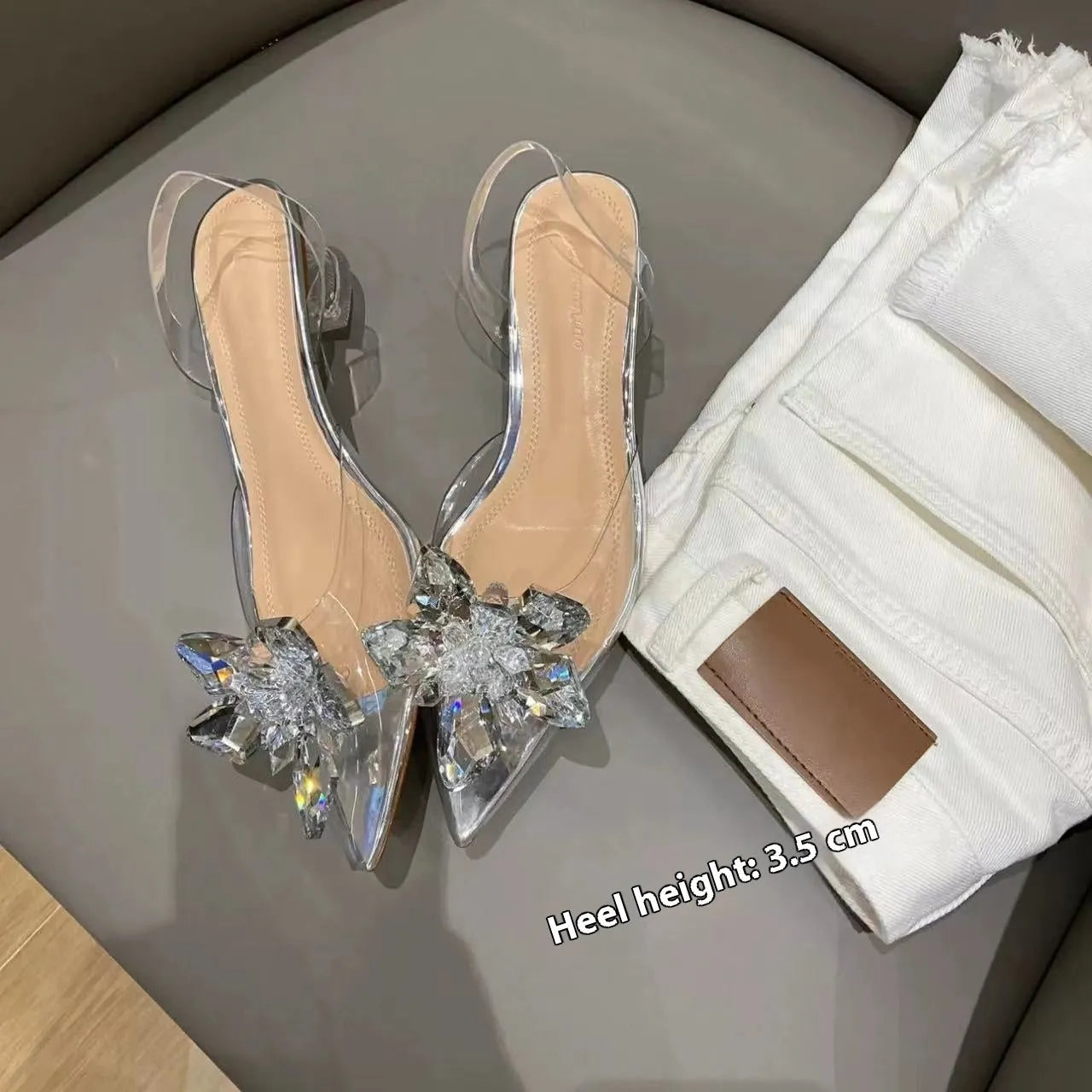Women's high heels with transparent crystal flower decoration and pointed toe in microfiber