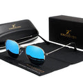 Classic round-frame sunglasses for men in black, showing polarised lenses and acetate build on a wooden surface.