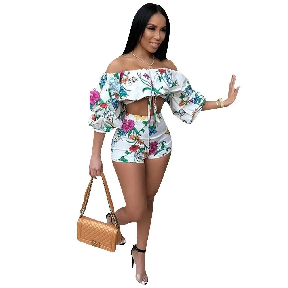 Multicolour digitally printed two-piece outfit with fluffy long sleeves and shorts.