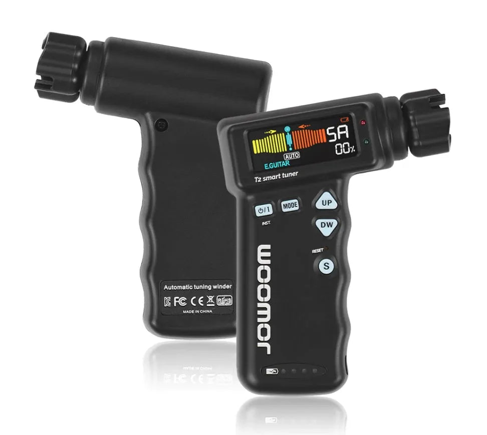 Black and white smart guitar tuner with integrated string winder and colour LCD display on a guitar headstock.