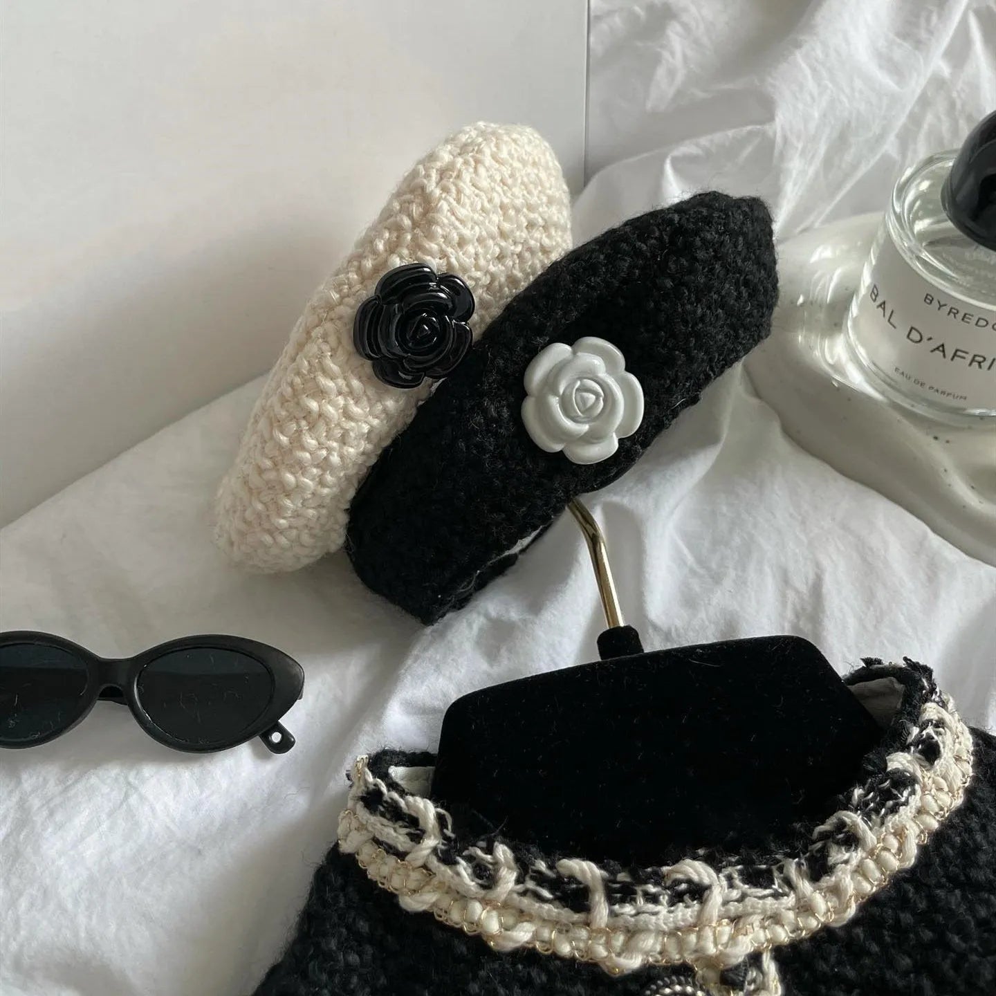 Small pet wearing knitted hat in black or beige, chemical fibre, 40cm head circumference