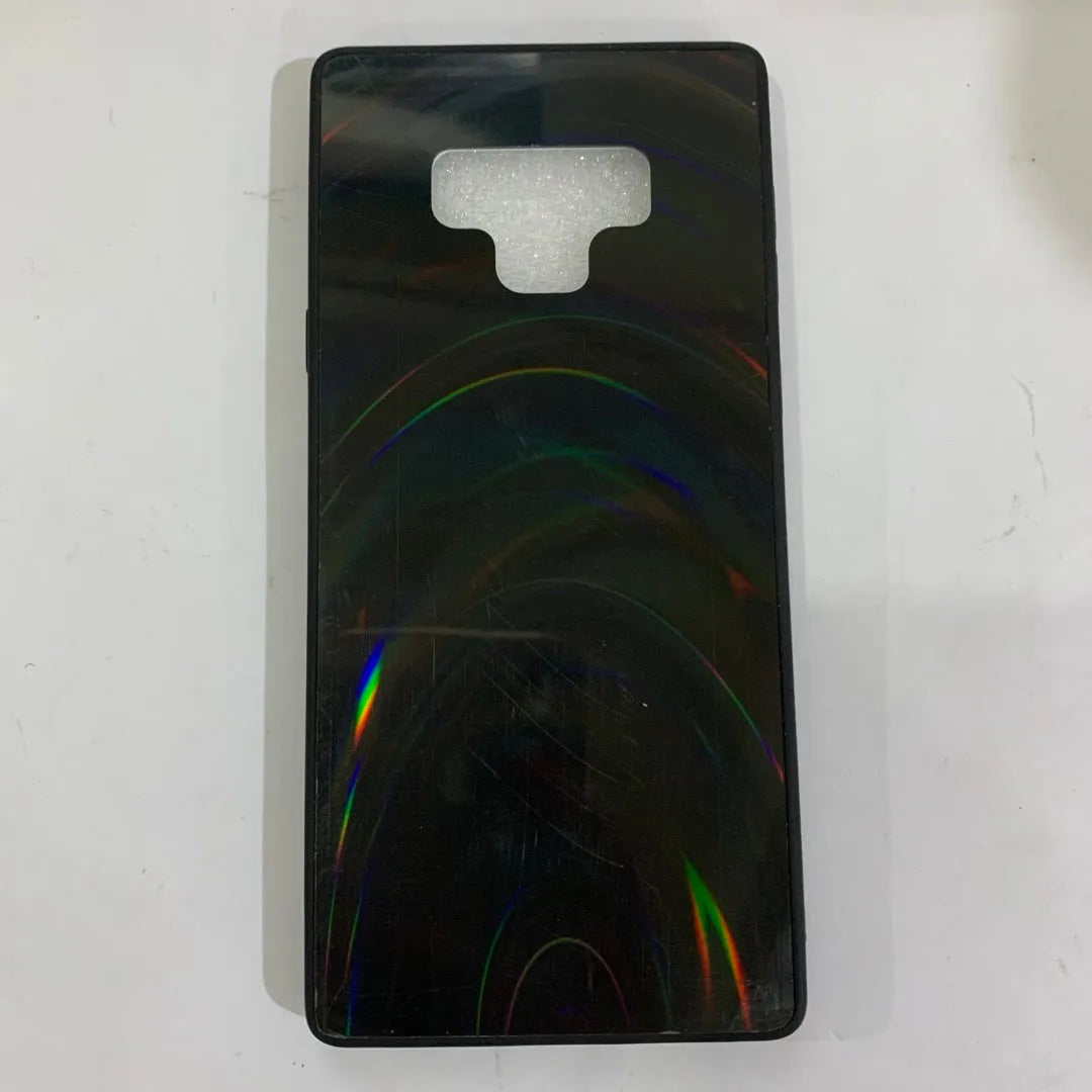A 3D rainbow glitter gradient back cover case for a smartphone, showing its full-coverage design and sparkling finish.