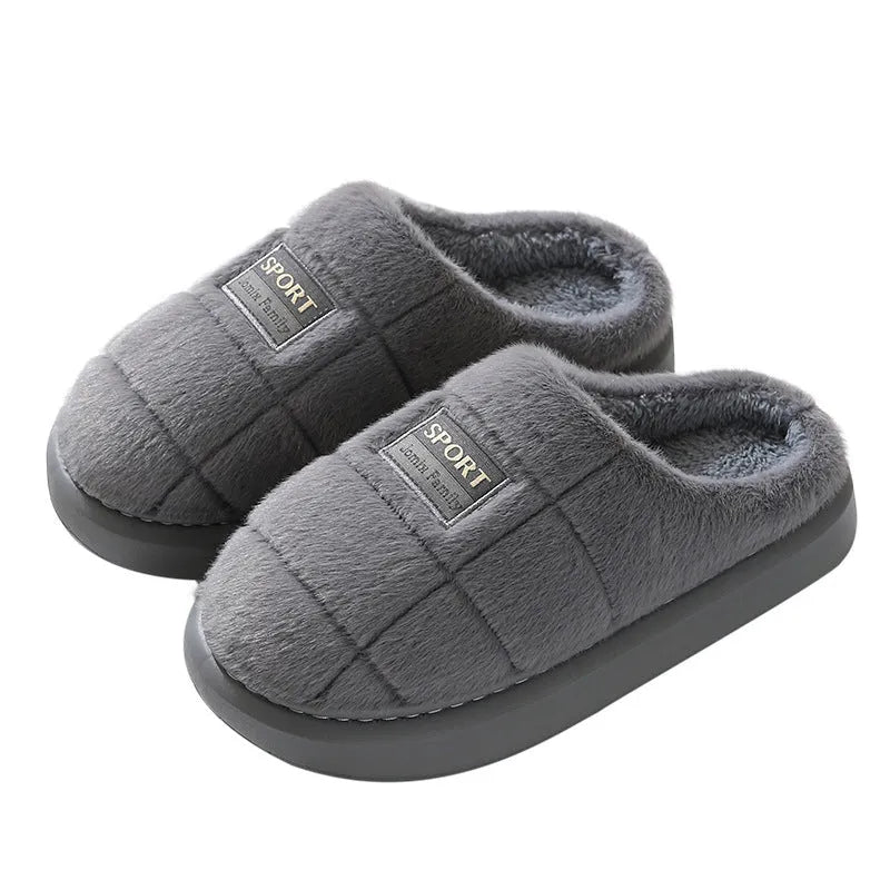 Men's grey plaid winter slippers with thick sole and rabbit hair upper.