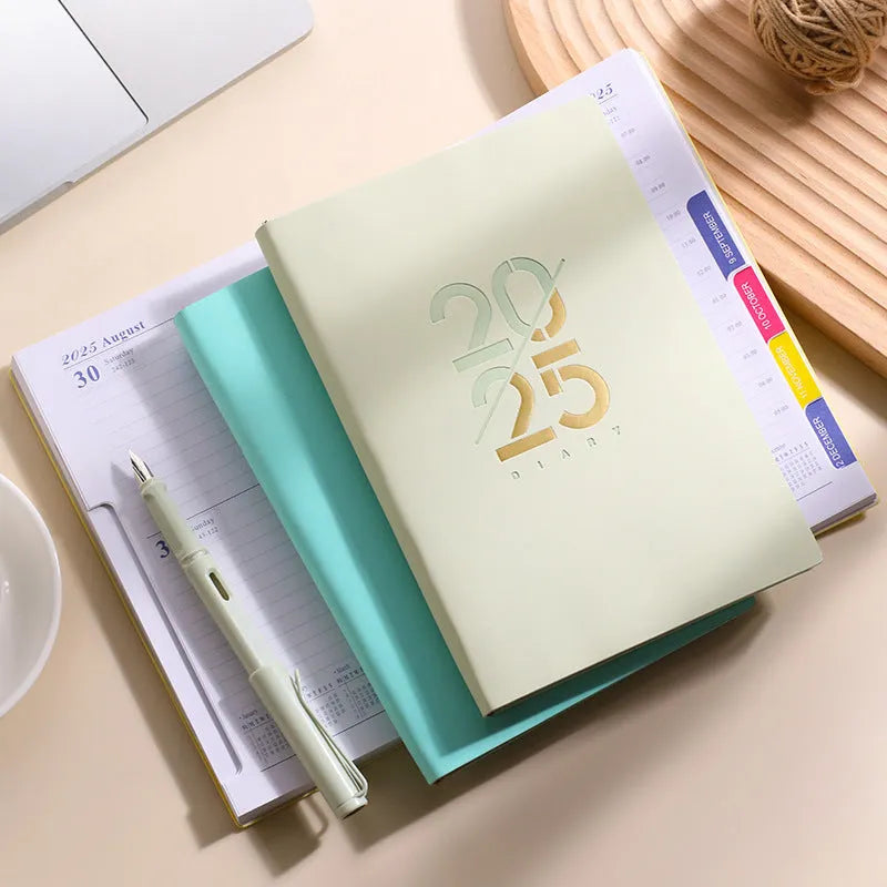 A5 faux leather daily planner schedule book open showing Dorian paper pages with 2025 calendar