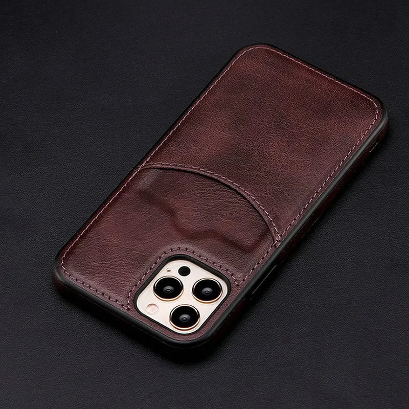Dark blue PU leather protective case fitted on an iPhone showing textured finish and precise button cut-outs.