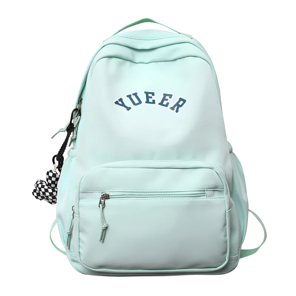 Simple nylon backpack for women, 32cm, with computer pocket, in five colours including black, blue, red, white, and light green.