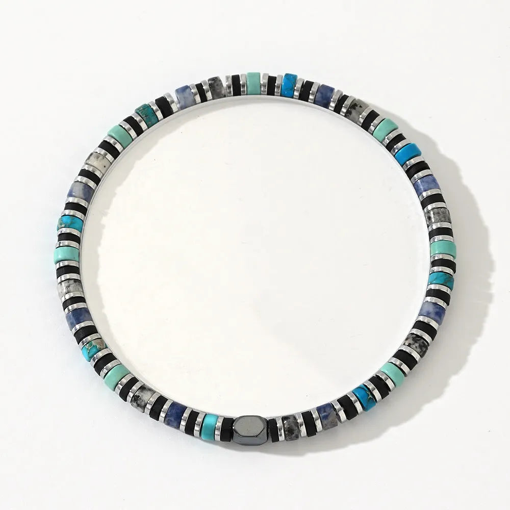 Hand-woven bohemian bracelet with natural semi-precious stones in cylindrical geometry design