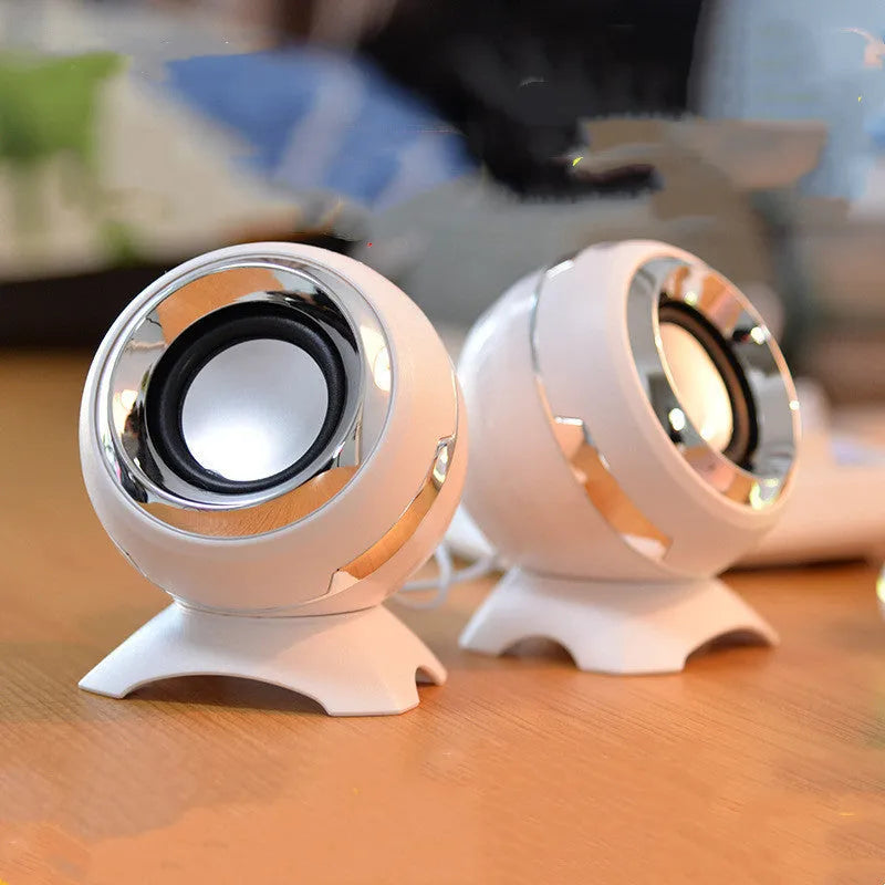 Compact black and gold USB desktop speakers for laptop computers with audio cable