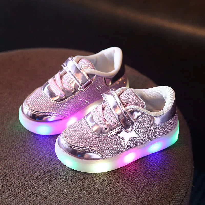 Golden, pink and silvery children's LED shoes with light-up soles, showing size chart from 21 to 30cm.