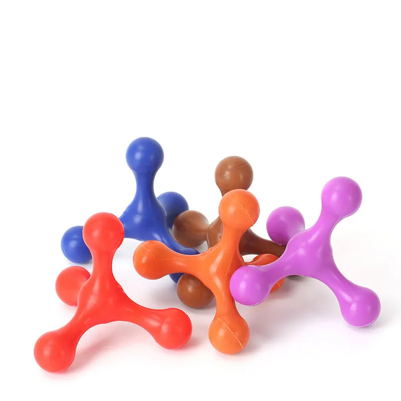 Blue silicone dog chew toy with three legs on a white background.
