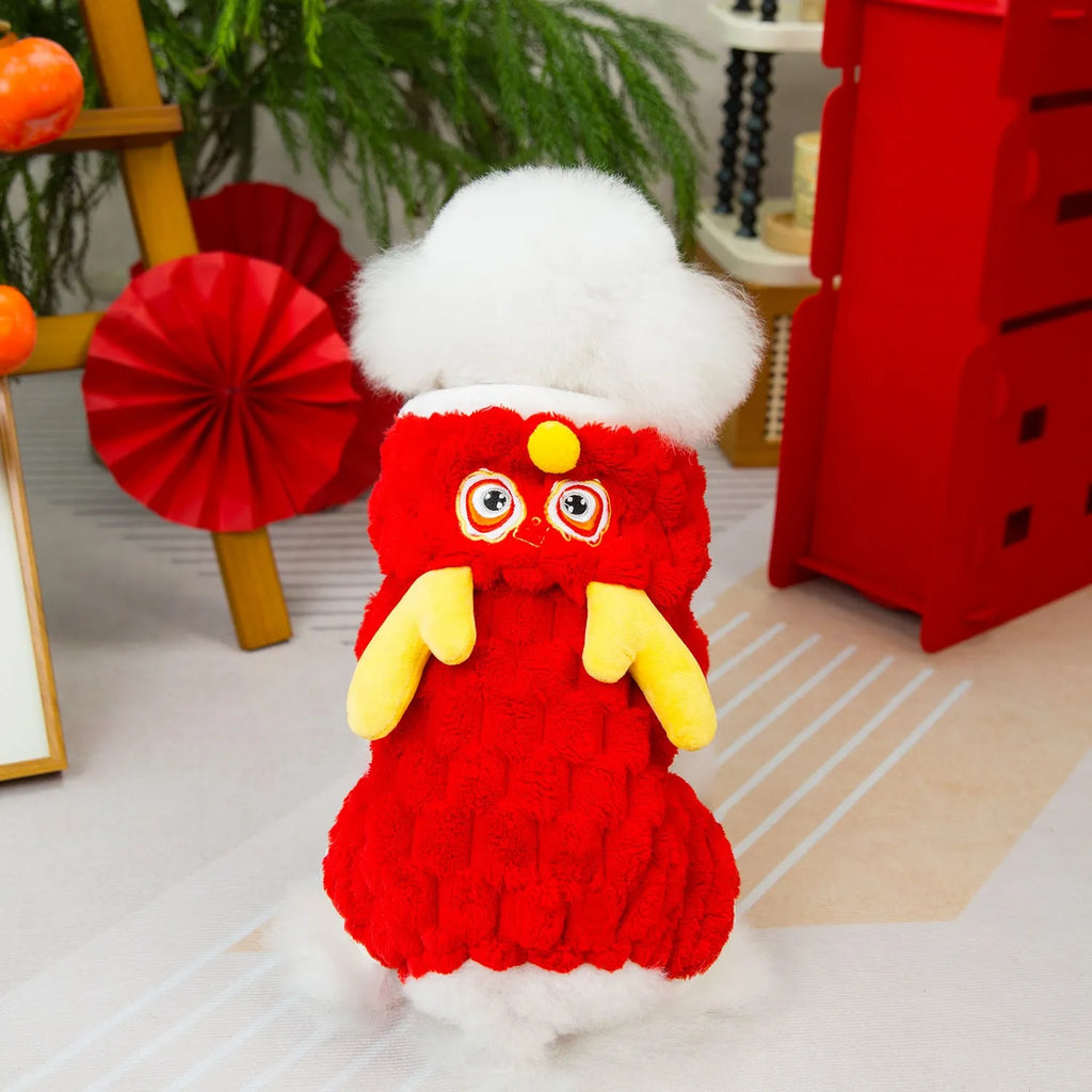 Red double-sided velvet pet jacket with cartoon dragon design shown on dog model