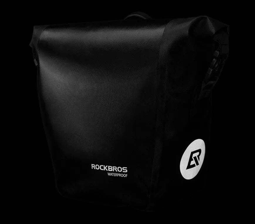 Bicycle waterproof bag made of nylon cloth and waterproof fabric, black colour, shown on a bike for cycling storage