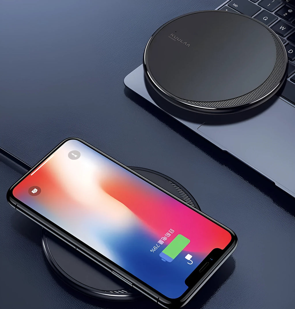 Black circular wireless disc charger for mobile phones with LED indicator light