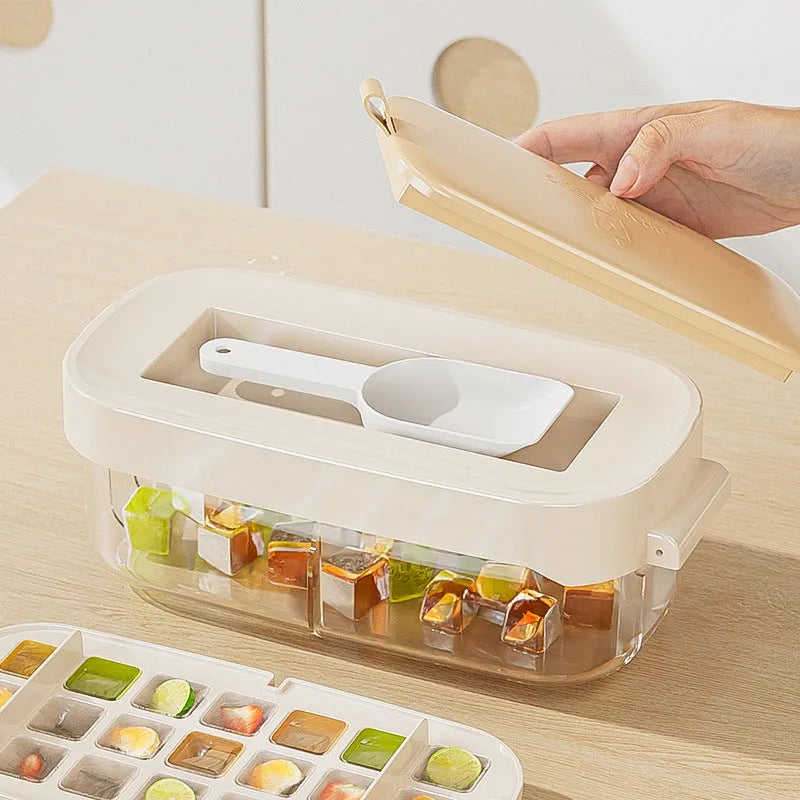 High-capacity ice cube tray ice box grid in blue with an ice shovel stored in its slot.