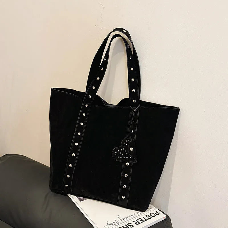 Black PU leather tote bag with double shoulder straps showing sandwich pocket and horizontal square shape