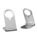 Silver vertical adjustable magnetic phone mounting bracket for iPhone12 on a desk.