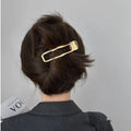 Women's zinc alloy hair barrettes in gold and silver with arc, square, and triangle shapes