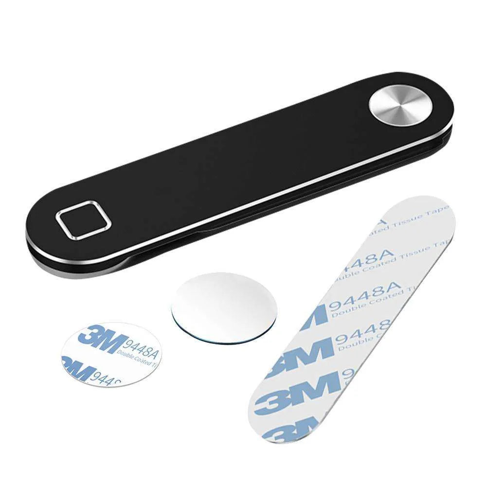 Black aluminium magnetic phone holder clipped to side of a silver laptop.