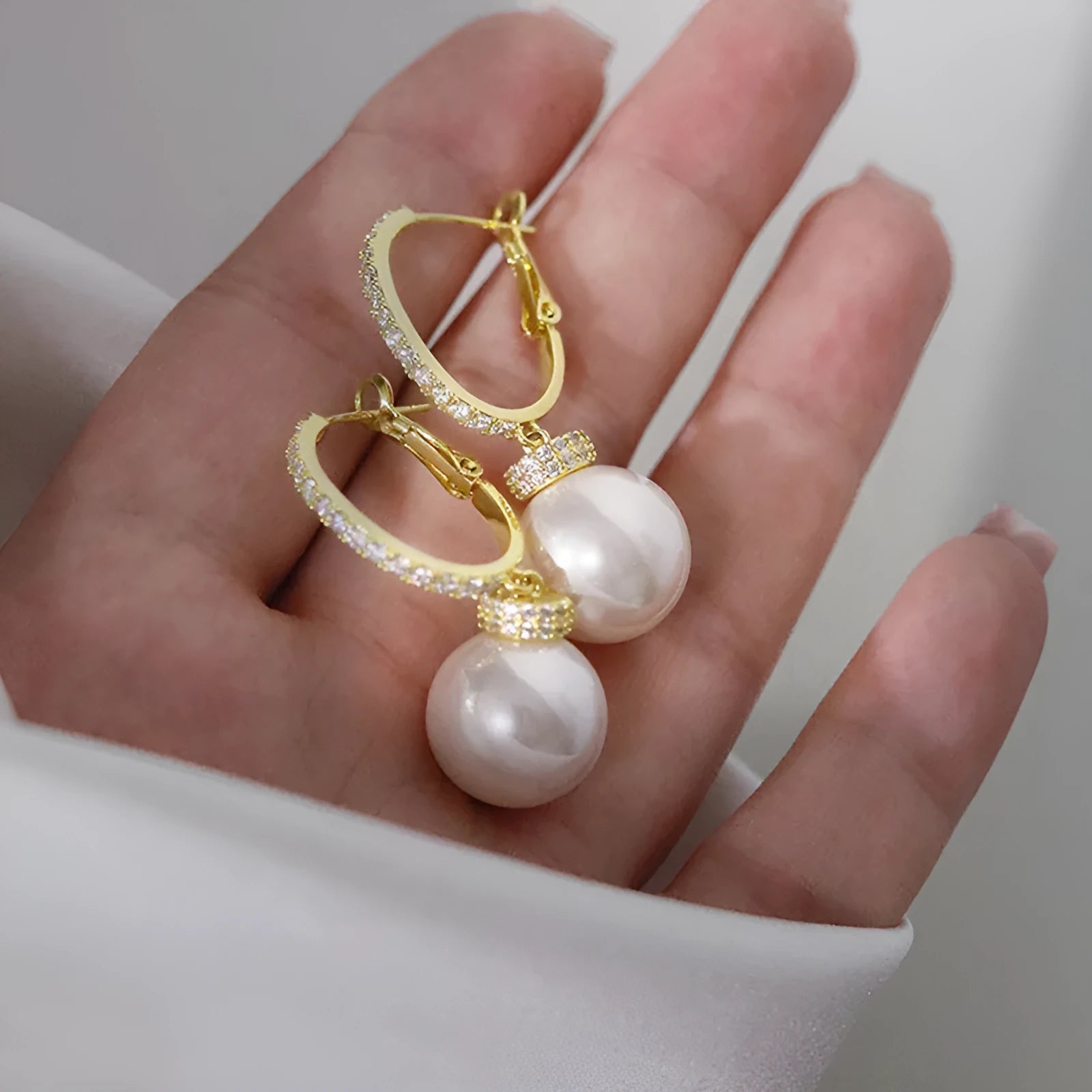 Yellow gold copper earrings with imitation pearl and zircon inlay geometric round ring style