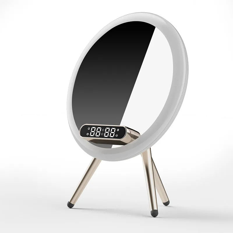 Multi-function LED mirror alarm clock with wireless charger and Bluetooth speaker in white colour on wooden desk