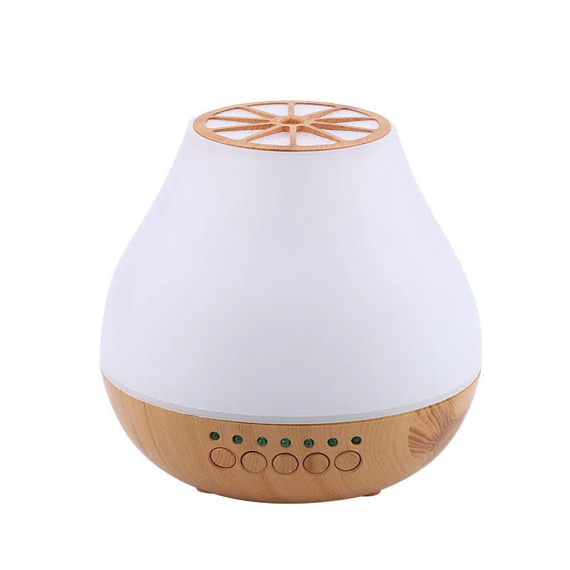 Wood grain finish USB essential oil aroma diffuser with optional Bluetooth control on a table