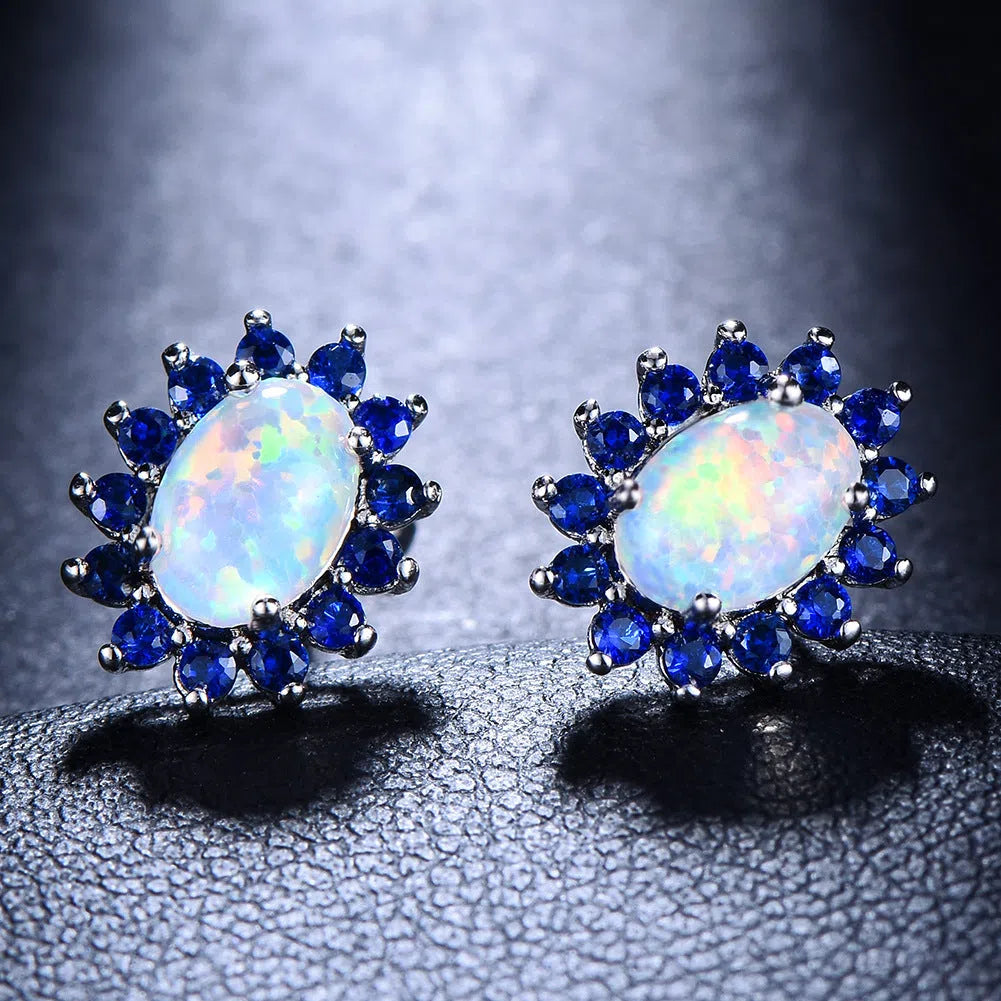 Oval diamond stud earrings in copper with electroplated platinum-tone finish, geometric shape, one pair