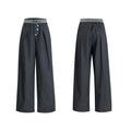 Drooping straight-leg casual pants in black with high waist and button open line design.