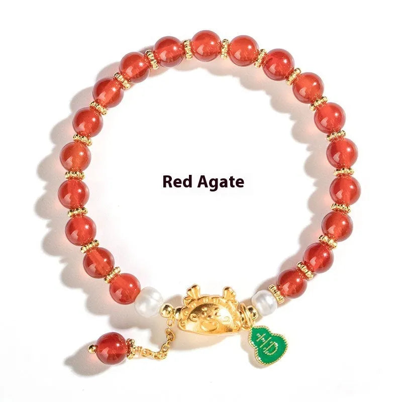 Handmade agate bracelet with 8mm diamond-shaped beads in zodiac design