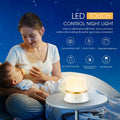 White bedside night light with touch controls, motion sensor, and rechargeable battery.