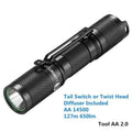 Black Lumintop Tool AA2.0 compact keychain flashlight with magnetic tail cap on a keyring.