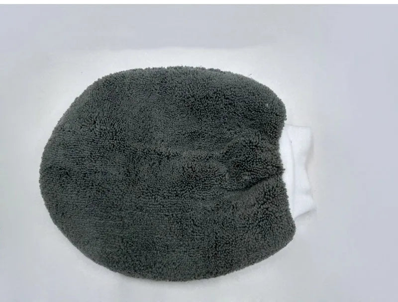9-piece car wash cleaning kit with polyamide towels, sponge, tyre brush, and waxing cakes in dark grey and orange
