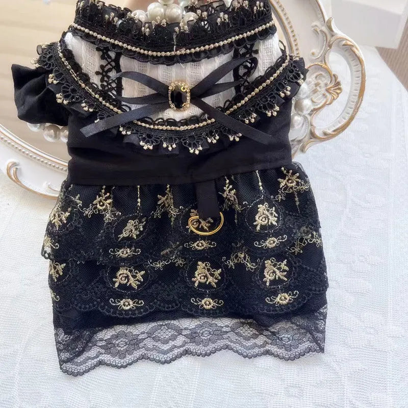 Golden gothic-style flared skirt for a small dog or cat on a white background.