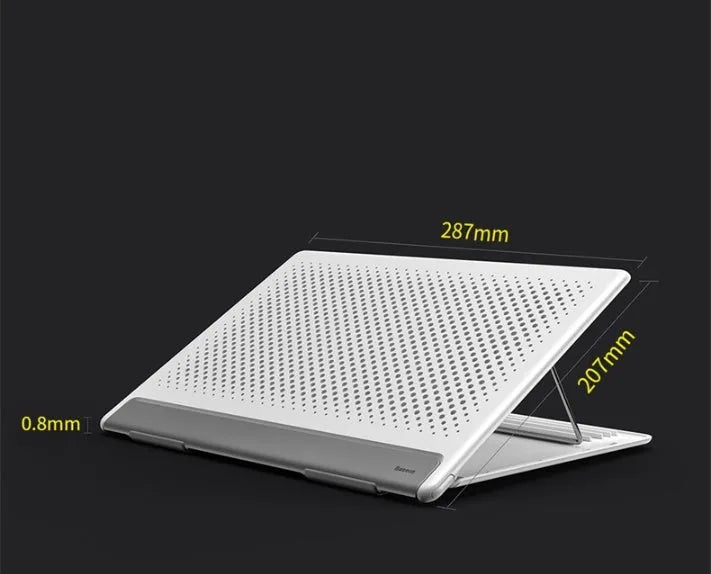 Portable black aluminium notebook stand folded flat next to a laptop