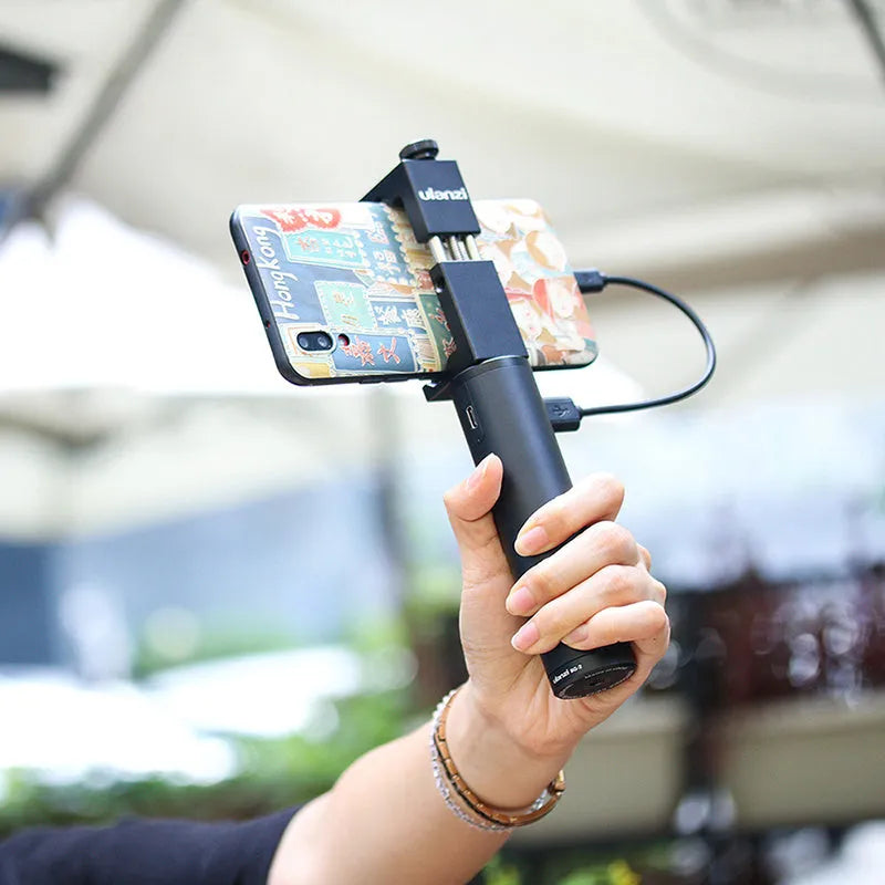 Black aluminium portable power bank with handle and 6800mAh capacity