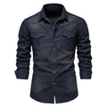 Men's slim fit long-sleeved denim shirt in solid colour with button-up front.