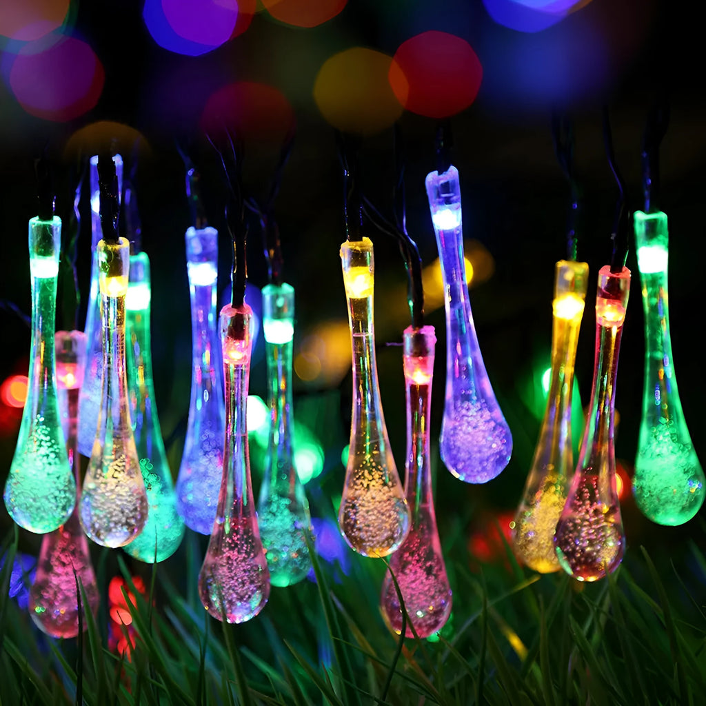 Solar LED string lights with bubble drop pendants for outdoor garden decoration