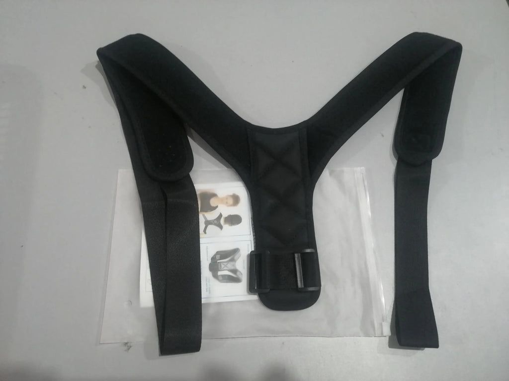 Black elastic posture corrector belt with adjustable webbing on a light background