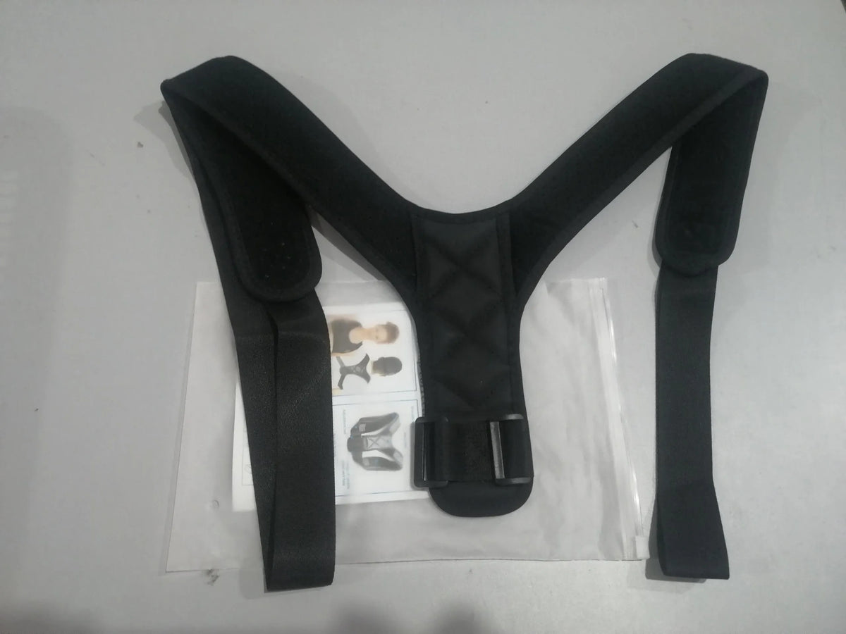 Black elastic posture corrector belt with adjustable webbing on a light background